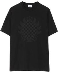 Burberry - Schwarzes baumwoll-t-shirt mit logo-detail - Lyst