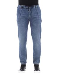 DISTRETTO12 - Jeans in cotone blu con chiusura a bottoni e pizzo - Lyst
