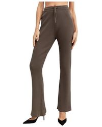 Nanushka - Broeken ,Grijs ,Nylon Ribgebreide Flared Broek - Lyst