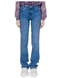 Guess - Jeans donna blu con zip e bottone - Lyst