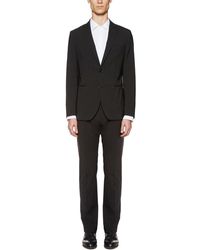 Tonello - Kostuums ,Zwart ,Wol Stretch Wollen Jurk Met Twee Knopen - Lyst