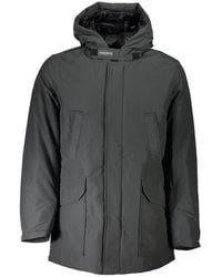 Woolrich - Giacca parka in cotone grigio con logo - Lyst