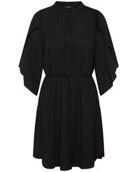 Bruuns Bazaar - Vestido negro elegante con mangas statement - Lyst