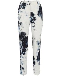 Alexander McQueen - Pantalones de talle alto con estampado floral - Lyst