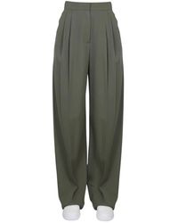 McQueen - Broeken ,Groen ,Wol Geplooide Wijde Pijpen Broek - Lyst