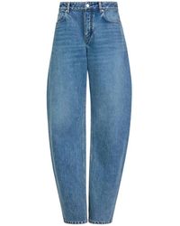 Alaïa - Round Denim Jeans - Lyst