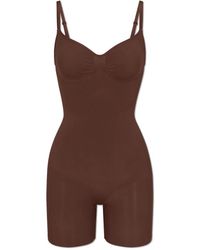 Skims - Ondergoed ,Bruin ,Nylon Seamless Sculpt Mid-Thigh Bodysuit - Lyst