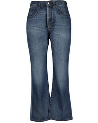 Victoria Beckham - Ausgestellte jeans in rohem blauem baumwolle - Lyst