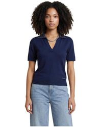 Guess - Tops ,Blauw ,Wol V-Hals Wollen Poloshirt Met Korte Mouwen - Lyst