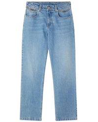 Stella McCartney - Iconic falabella chain mid jeans - Lyst