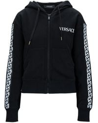 Versace - Kapuzen-sweatshirt mit reißverschluss und markendetails - Lyst