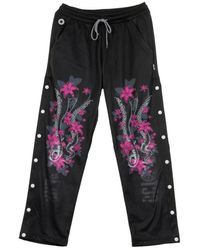 Octopus - Schwarze Lily Logo Trainingshose - Lyst