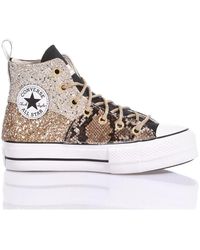 Converse doradas cheap y plateadas