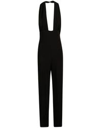 Norma Kamali - Jumpsuits & Playsuits ,Zwart ,Leer Cross Halter Jumpsuit Met Rechte Pijpen - Lyst
