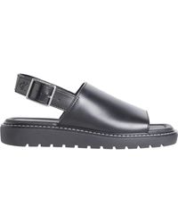 Calvin Klein - Schoenen ,Zwart ,Zwarte Platte Sandalen Voor Vrouwen - Lyst