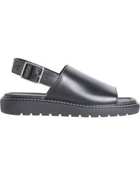 Calvin Klein - Schwarze Flache Sandalen Für Frauen - Lyst
