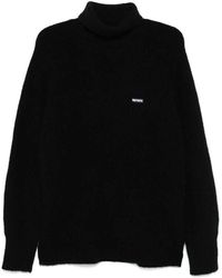 ROTATE BIRGER CHRISTENSEN - Schwarzer rollkragenpullover - Lyst