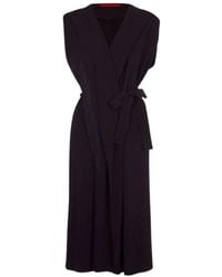 Carolina Herrera - Kleedjes ,Zwart ,Zwarte Crêpe Wrap Jurk Met Franjes - Lyst