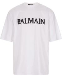 Balmain - Oversize t-shirt mit kristall-logo - Lyst