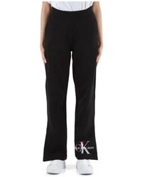 Calvin Klein - Pantalones deportivos de algodón con estampado de logo - Lyst