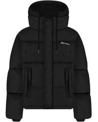 flâneur - Schwarze steppjacke mit signatur-logo flâneur - Lyst