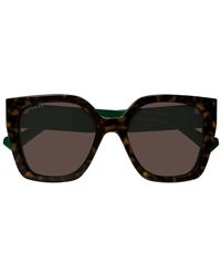 Gucci - Sonnenbrille Gg1300 S 002 Braun/Braun Damen - Lyst