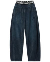 Alexander Wang - Jeans ,Blauw ,Denim Logo Elastische Geborstelde Denim Joggingbroek - Lyst