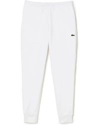 Lacoste - Broeken ,Wit ,Katoen Witte Slim Fit Broek Met Logo Borduursel - Lyst