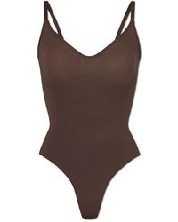 Skims - Ondergoed ,Bruin ,Nylon Seamless Sculpt Thong Bodysuit - Lyst