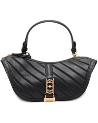La Carrie - Doppelauge Handtasche Leder Schwarz - Lyst
