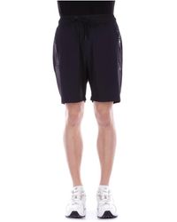 CoSTUME NATIONAL - Schwarze cnc shorts mit reißverschlusstaschen - Lyst