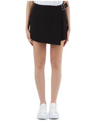 Calvin Klein - Minifalda de tela elástica con cremallera - Lyst