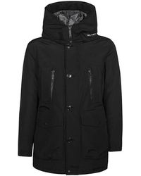 Woolrich - Jassen ,Zwart ,Zwarte Gewatteerde Eendendons Jas Met Capuchon - Lyst