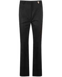 Versace - Broeken ,Zwart ,Zwarte Slim-Fit Broek Met Gouden Logo - Lyst