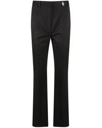 Versace - Broeken ,Zwart ,Zwarte Slim-Fit Broek Met Gouden Logo - Lyst