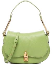 Coccinelle - Grüne ledertasche mit drehverschluss - Lyst