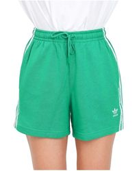 adidas Originals - Grüne und weiße 3-streifen shorts - Lyst