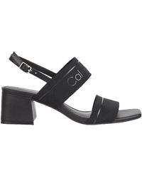 Calvin Klein - Eleva tu estilo con sandalias de tacón alto - Lyst