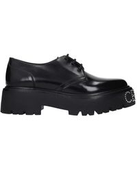 Celine - Schwarze Lederformelle Schnürschuhe - Lyst