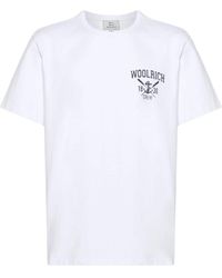 Woolrich - Magliette in cotone con stampa logo - Lyst