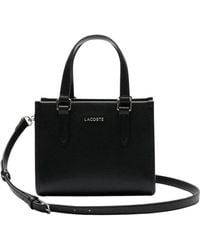 Lacoste - Handbags - Lyst