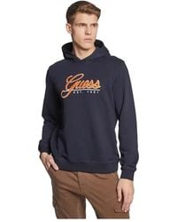 Guess - Hoodies & Sweatvesten ,Blauw ,Stijlvolle Hoodie Sweatshirt - Lyst