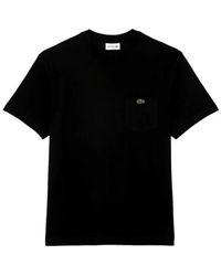 Lacoste - Tops ,Zwart ,Katoen Zwarte Katoenen T-Shirt Met Borstzak - Lyst