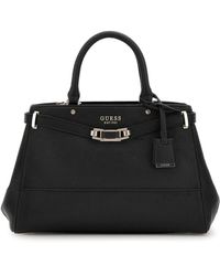 Guess - Schwarze bucket-tasche silvye - Lyst