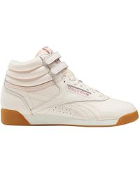 Zapatillas de corte alto Reebok de mujer: hasta el 50 % de descuento | Lyst