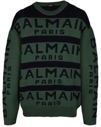Balmain - Maglione verde in lana con logo blu navy - Lyst