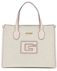 Guess - G status 2 fächer natur/lichtrosa tasche - Lyst