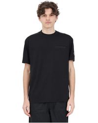 Calvin Klein - T-shirt nera jeans con patch logo - Lyst