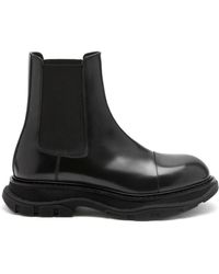 Alexander McQueen - Schwarze slip-on stiefel mit elastischen seiten - Lyst