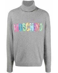 Dolcevita stampato grigio di Moschino, €475 | farfetch.com | Lookastic